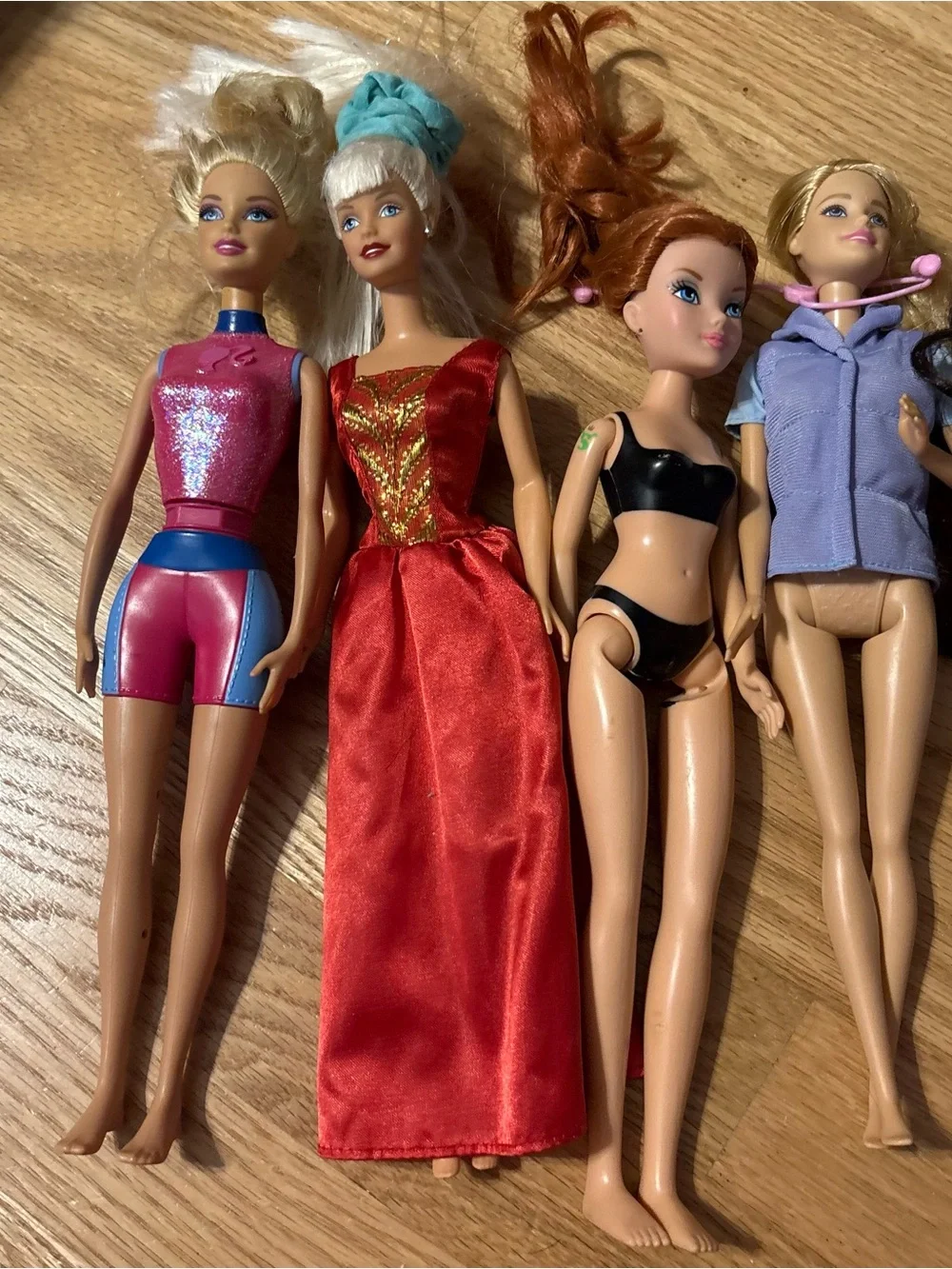 Barbie Doll Lot with Pink, Red, Black, Purple and Silver Outfits Tripod